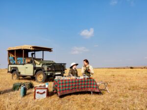 amily on a game drive, observing wildlife in the African safari