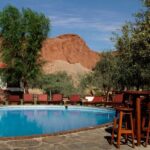 Poolside relaxation under the clear Namibia sky