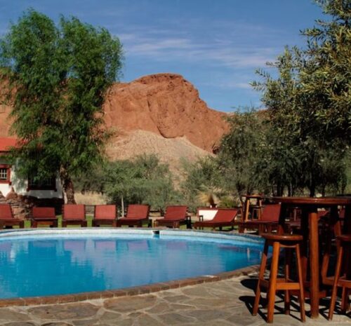 Poolside relaxation under the clear Namibia sky